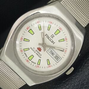 Vintage 1989 Ricoh Automatic Mens Silver Watch W/daydate & White accents